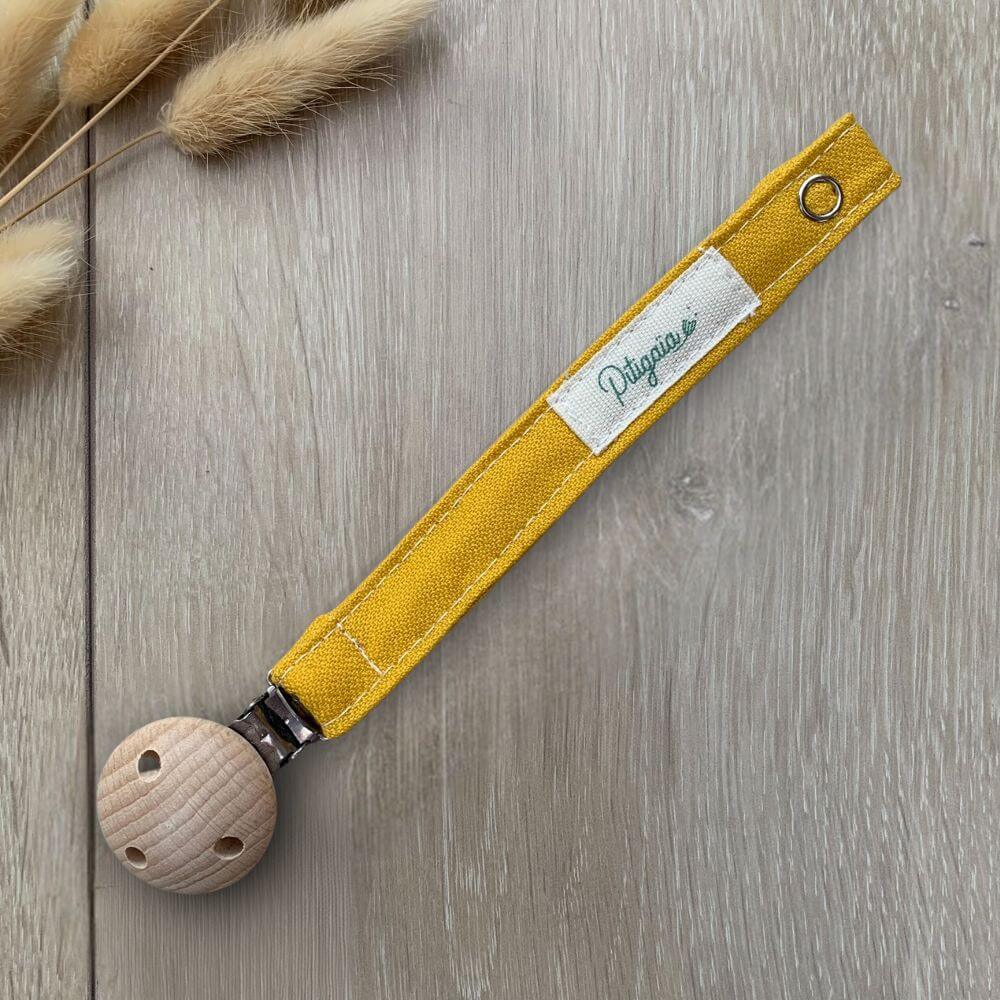 attache-tétine coton bio et bois de hêtre naturel Pitigaïa jaune moutarde