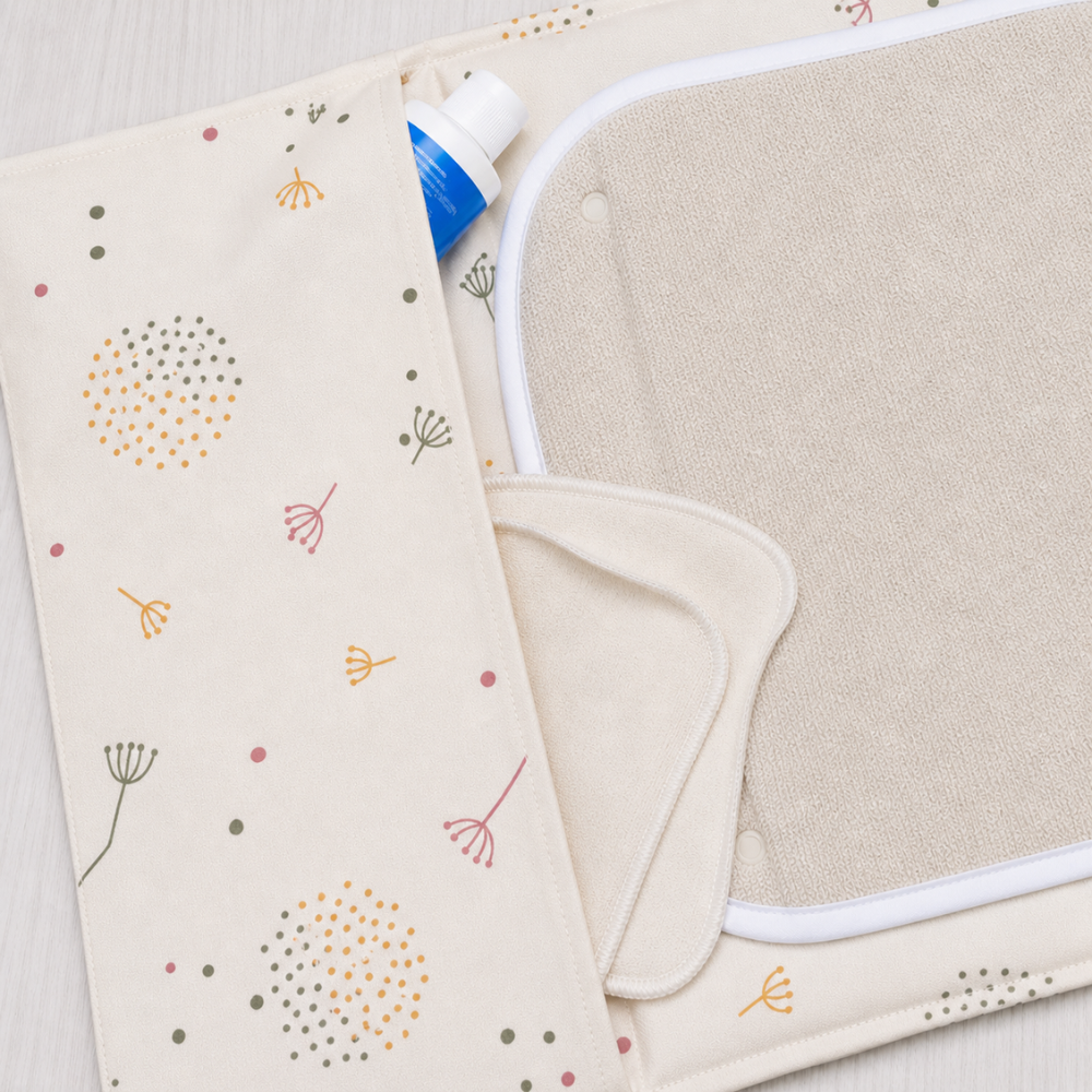 tapis à langer nomade imprimé dandelion en coton bio Pitigaïa détail pochette intérieure